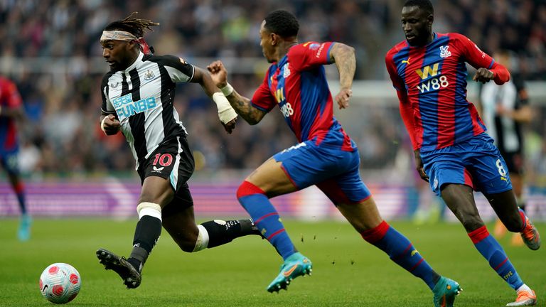 Alain Saint-Maximin of Newcastle United (left), followed by Nathaniel Clyne of Crystal Palace (centre) and Shekho Kouyate.