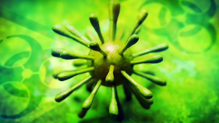 Die schematische Darstellung einer Coronavirus-Variante zeigt eine grüne Kugel mit weit hervorstehenden Ausstülpungen. (www.imago-images.de)