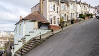 View of houses on steep Vale Street in Bristol UK