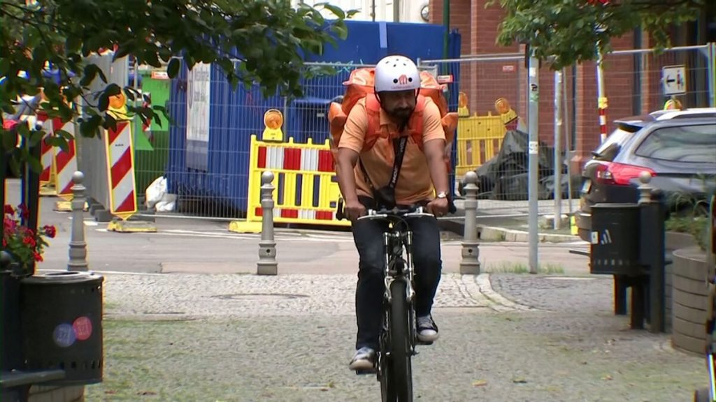 Video.  This former Afghan minister is now a bicycle delivery driver in Germany