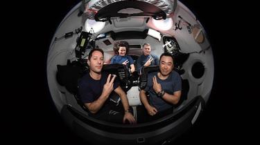 The four astronauts are scheduled to land on Monday in Florida.