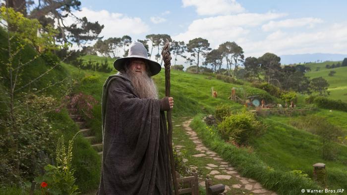 Scene from The Hobbit: An Unexpected Journey: Gandalf the Wizard in a Hat and a Magic Walking Wand