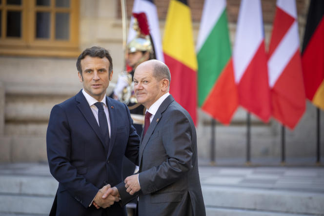 Emmanuel Macron and German Chancellor Olaf Schulz, during the informal summit of European Union member states, at the Palace of Versailles, March 10, 2022.
