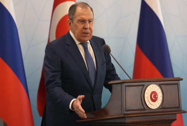 Russian diplomatic chief Sergei Lavrov is attacked by a Ukrainian journalist