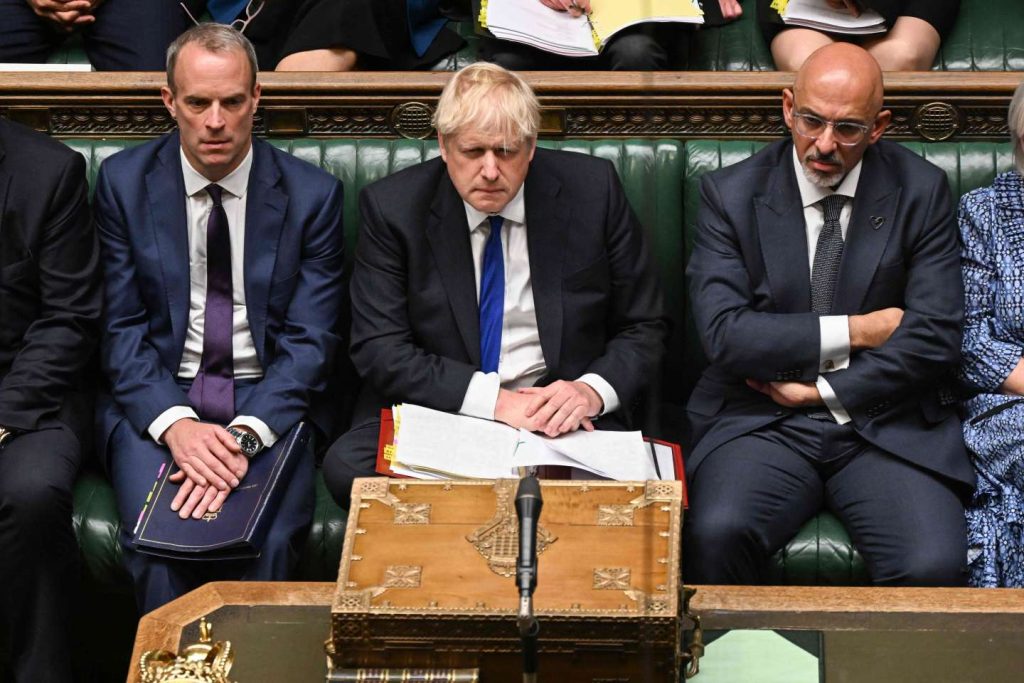 Boris Johnson clings to Downing Street despite dozens of government resignations