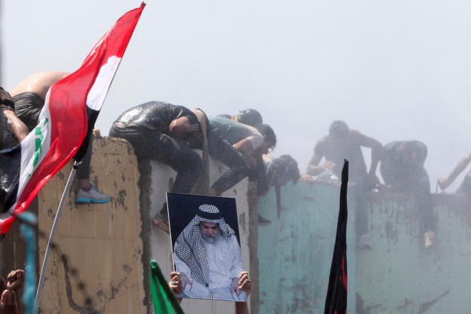 Supporters of Shiite imam Muqtada al-Sadr demonstrate against corruption in Baghdad, July 30, 2022. 