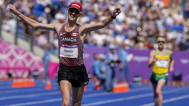 Canada's Evan Dunphy walks to Commonwealth Games gold