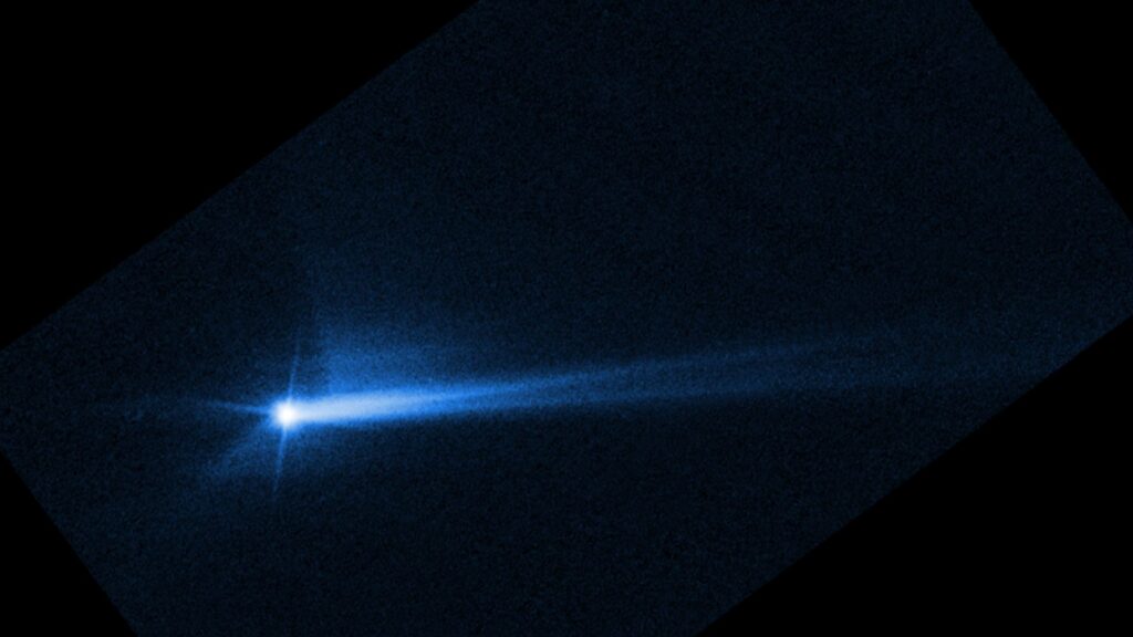 The asteroid seen by Hubble a few days after the DART collision.  // Source: NASA/ESA/STScI/Hubble (cropped image)