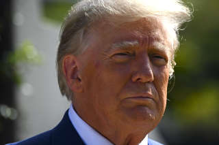 (Files) In this November 8, 2022 photo, former US President Donald Trump speaks to the media as he leaves a polling station after voting in the US midterm elections at the Morton and Barbara Mandel Recreation Center in Palm Beach, Florida.  - Former President Donald Trump filed a lawsuit on November 11, 2022 to challenge a subpoena from the House Committee to investigate the 2021 attack on the US Capitol, saying he did. 