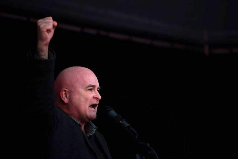 RMT union general secretary Mick Lynch at a rally in support of the Royal Mail workers' strike on December 9 (AFP/Daniel LEAL)